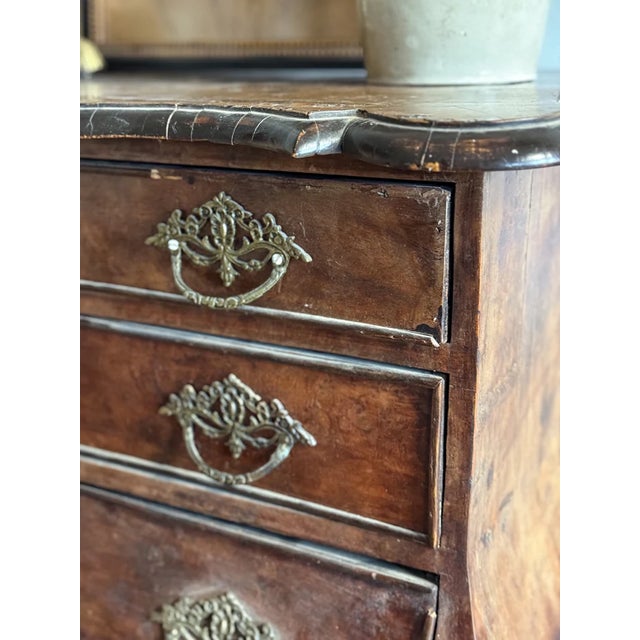 This stunning antique Dutch bombay chest is a remarkable piece that blends both functionality and European craftsmanship....