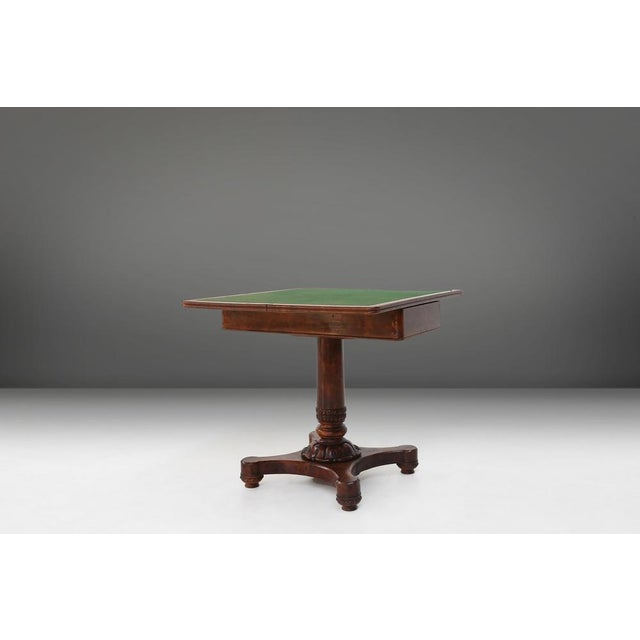 This card table is made from the finest burl veneer wood, which exudes a timeless beauty that enriches any space. The...