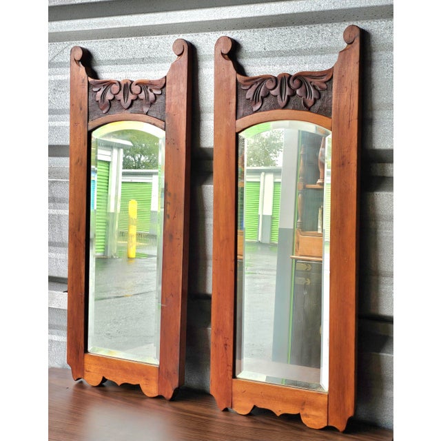 A Pair of 19th Century Victorian Carved Maple Frame Wall Mirrors. Meaure 11.5" in width and 29" in height.