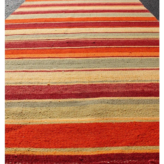 Vintage Hand Woven Turkish Kilim Runner With Stripes in Red, Green, Yellow, and Orange For Sale In Atlanta - Image 6 of 11