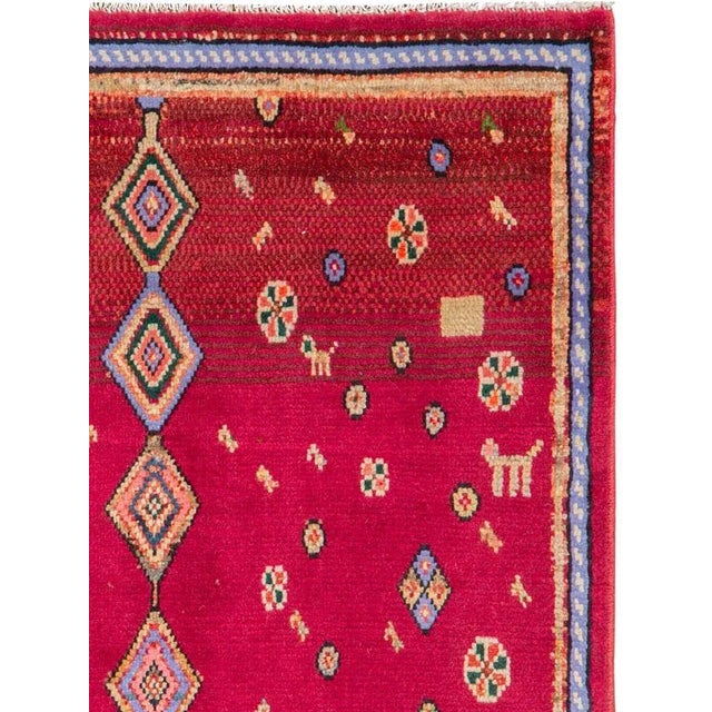 A vintage Persian hamadan rug from the mid-20th century. Hamadan town and the surrounding weaving area of about 120...