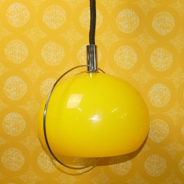 Cool, impressive 70s space-age ceiling lamp Looks like a glowing planet. Plastic body - bright yellow translucent. with...