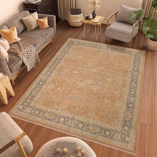 Enhance the ambiance of your home with this magnificent Persian-influenced Turkish hand-knotted rug made by skilled...