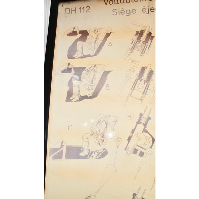 This is an original framed Martin Baker ejector seat training poster for German pilots and dates to the 50s.