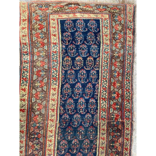 Very beautiful long tribal corridor carpet from the 19th century, with decorative designs by Botteh, and pretty natural...