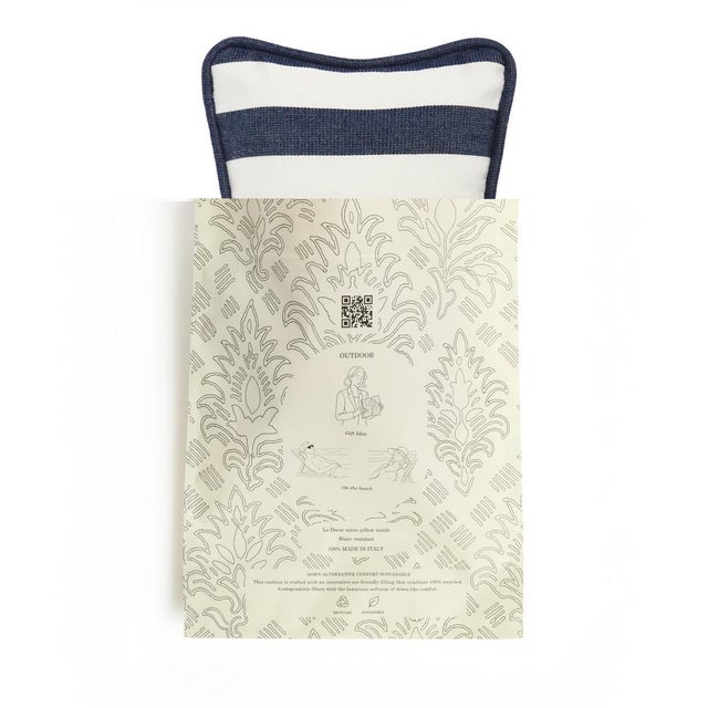 Bring a fresh Mediterranean touch to your outdoor spaces with this elegant striped cushion. Handcrafted in Italy from...