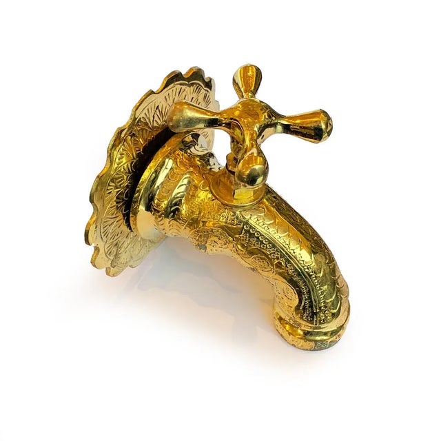 Vintage solid brass fountain spigot with design patterns. Spigot measures 4" from the wall without thread. Decorative off...