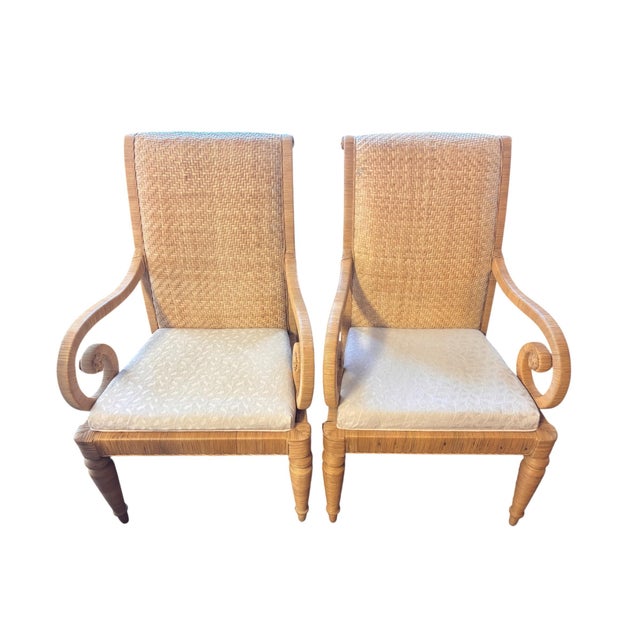 This distinctive pair of vintage high-back armchairs brings sculptural detail and warm natural texture to a room. Each...