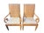 This distinctive pair of vintage high-back armchairs brings sculptural detail and warm natural texture to a room. Each...
