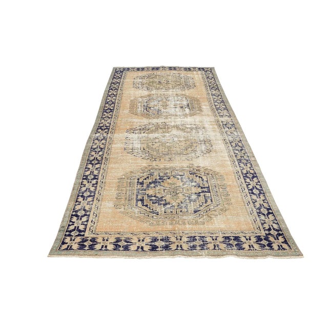 Handknotted vintage wool rug from Oushak region of Turkey. Approximatelly 50-60 years old. In very good condition.