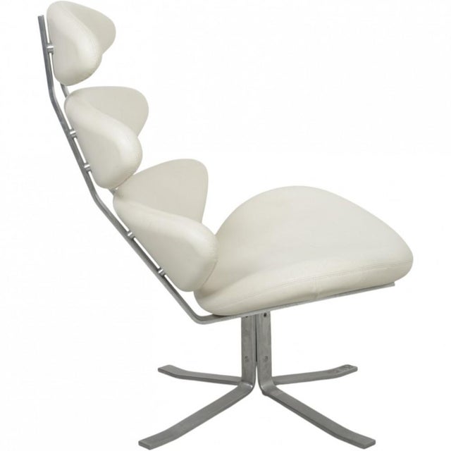 Erik Jørgensen Corona chair upholstered in white leather, and with a frame of brushed steel. The chair is from the 2000s...