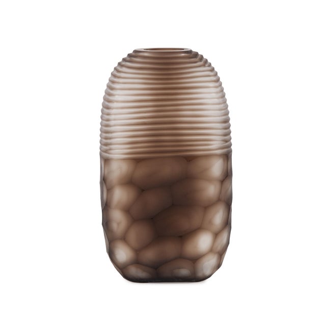 The cut patterns and the use of frosted and translucent techniques gives the Bruni tall vase it's uniqueness. The deep...