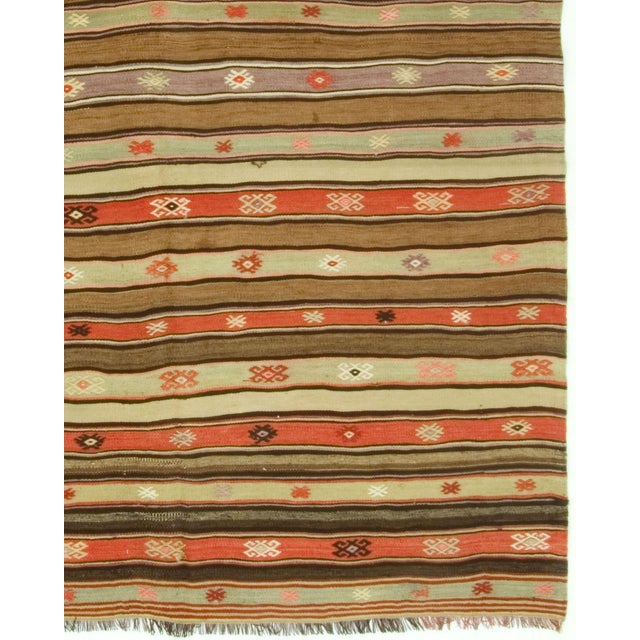 Vintage Turkish striped and geometric kilim handwoven in the 1940s.
