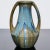 A Pierrefonds (France) Art Nouveau vase with Amphora form and two elegant handles. Glazed with beautiful crystalline star-...