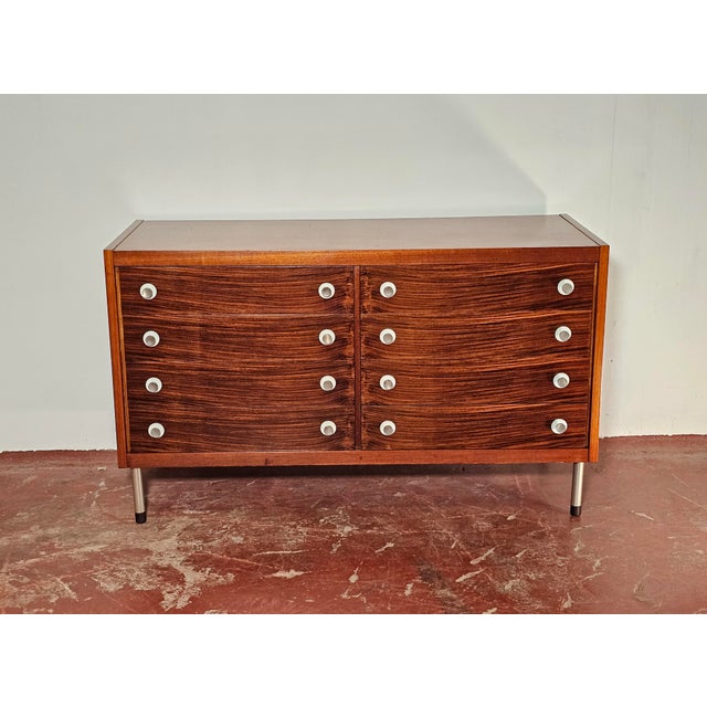 Splendid Italian-made teak chest of drawers designed by Georges Coslin for 3V. 8 spacious drawers. In excellent overall...