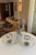 Stunning 1970s Space Age design three-arm chandelier. Chrome-plated metal frame and hand-blown glass globes. This is an...