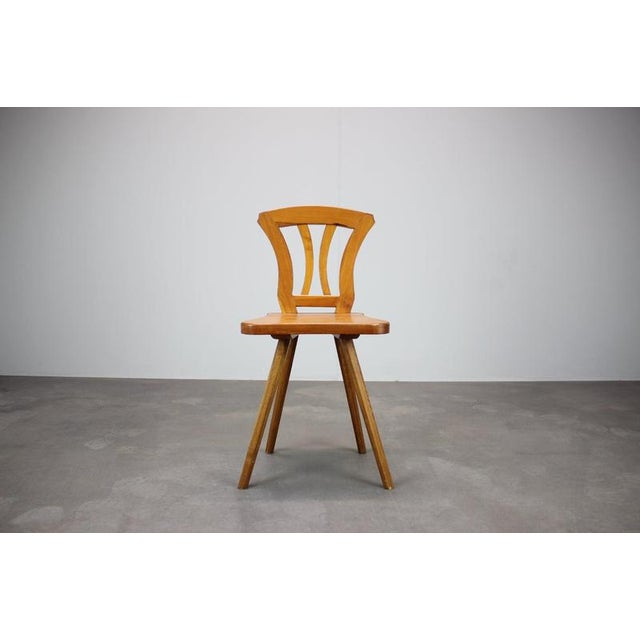 Vintage Czechoslovak farmhouse chair dating approximately to the mid-20th century, circa the 1940s–1950s. This traditional...