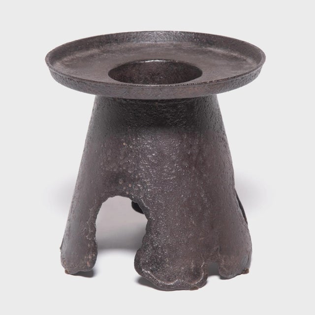 This early 20th century iron vessel is a Meiji-era vase designed especially for ikebana, the Japanese art of floral...