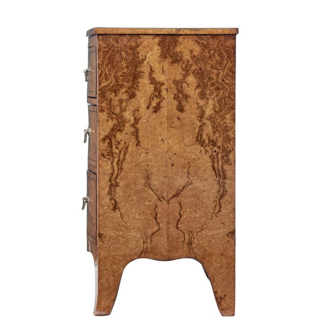 English burr walnut bow front chest circa 1870 with bookmatched veneer on the sides, four drawers, and splayed bracket...