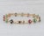 2010s 4.84ctw Ruby Sapphire Emerald Flower Tennis Bracelet 14k Yellow Gold 7" For Sale - Image 5 of 8