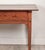 An American fruitwood one-drawer tavern table, circa 1810.