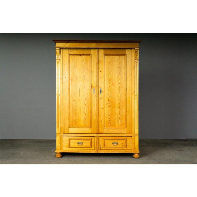 Item: Two-door wardrobe Period & Style: Art Nouveau - circa 1900 Features: - Simple and practical piece of furniture with...
