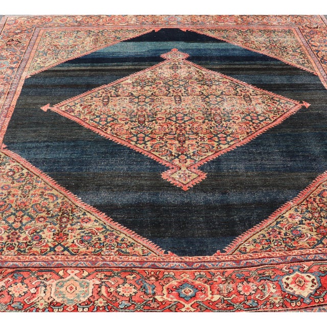 Antique Persian Sultanabad Rug With Medallion and Navy Blue Field. Country of Origin: Iran; Type: Sultanabad; Design:...