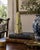 A beautifully proportioned marble obelisk in richly veined shades of yellow, cream, grey, and black. The sculptural...