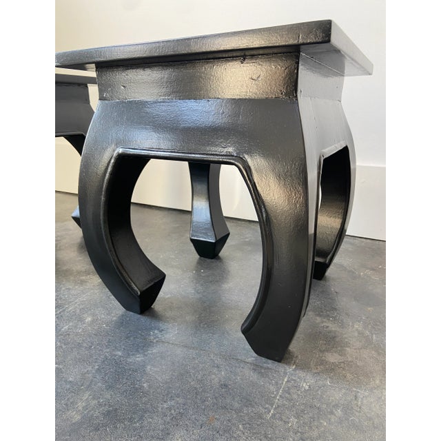 Small vintage curved leg stool that has been restored with a black lacquer paint. We have two available that match....