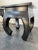 Small vintage curved leg stool that has been restored with a black lacquer paint. We have two available that match....