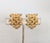 1960s goldtone lattice elongated pentagon shape clip and screw back earrings. Marked "Napier." Measure: 1 3/16 inches long...