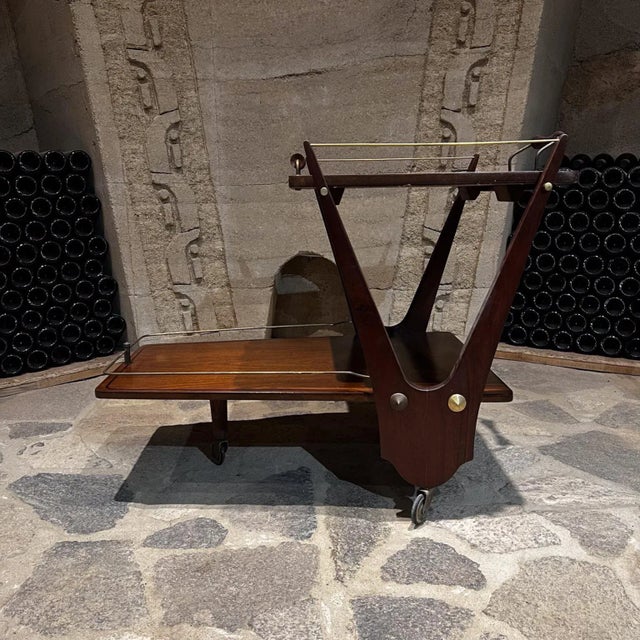 AMBIANIC presents 1950s Eugenio Escudero Wood Tiered Bar Service Cart Modern Mexico City Sensational tiered design with...