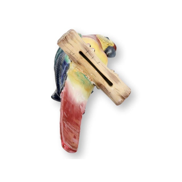 Colorful French faience parrots designed as whimsical decorative accents for planters, candle displays, or tabletop...