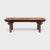 This antique Chinese bench follows the classic recessed-leg form, defined by its inset legs linked with straight...