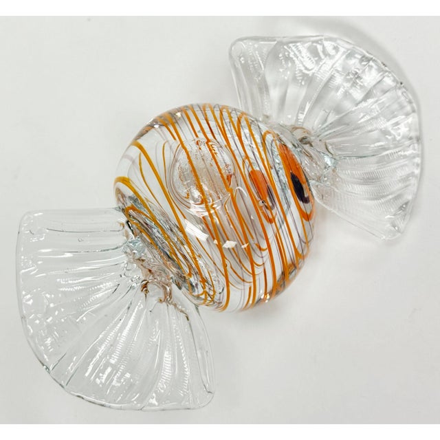Oversized vintage Murano style blown glass wrap candy. Clear bulb shape with red and yellow stripes measuring 5.75"W. No...