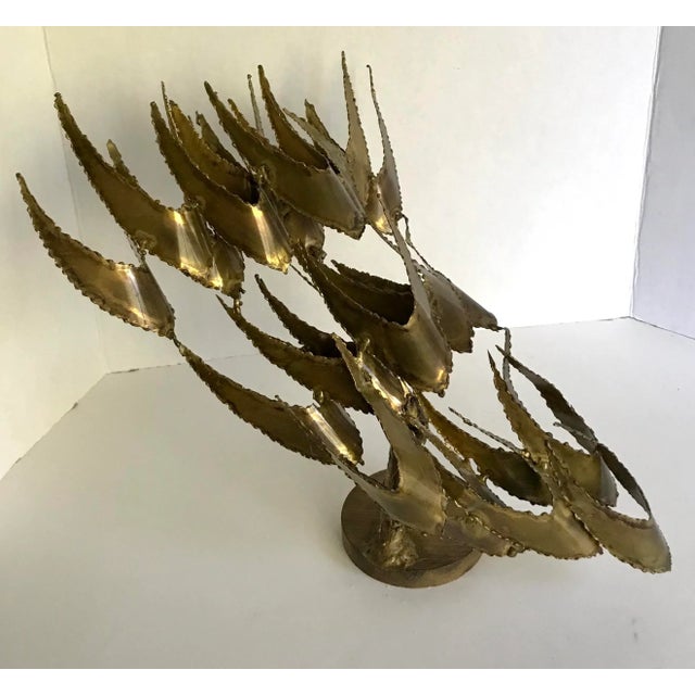 This is a gorgeous sculpture made in the mid-century with metal, which has so much movement and excitement. It appears to...