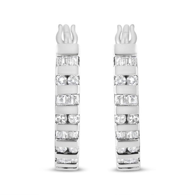 Accentuated by stunning baguette diamonds, these hoop earrings are ready to bring a touch of elegance to your look. Made...