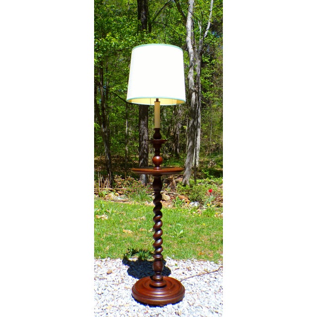 Vintage Solid Mahogany Barley Twist Floor Lamp Table features a tall barley twist column rising from a weighted concentric...