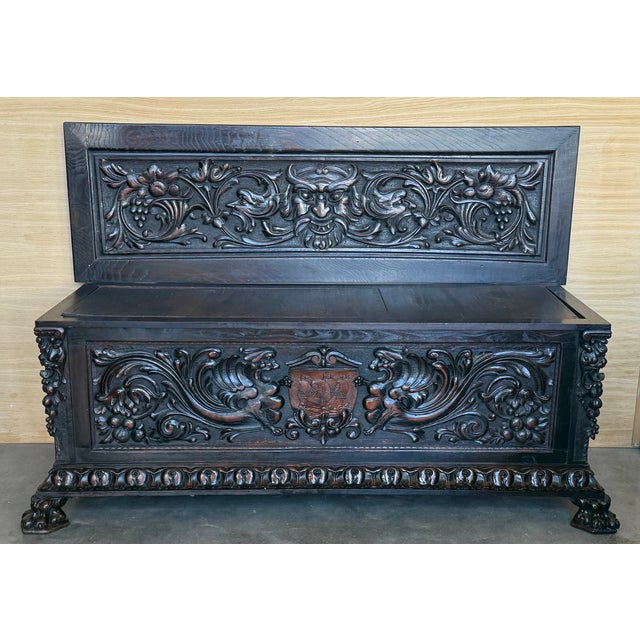 This 19th century solid walnut bench is richly made with Castilian motifs. Despite its age, the piece has a very solid...