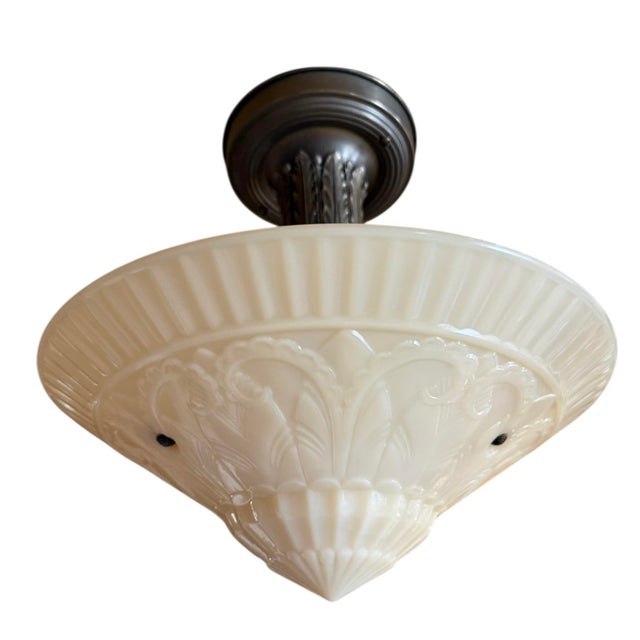 This semi-flushmount is great for any location of your home…especially with lower ceilings. Art deco period lights look...