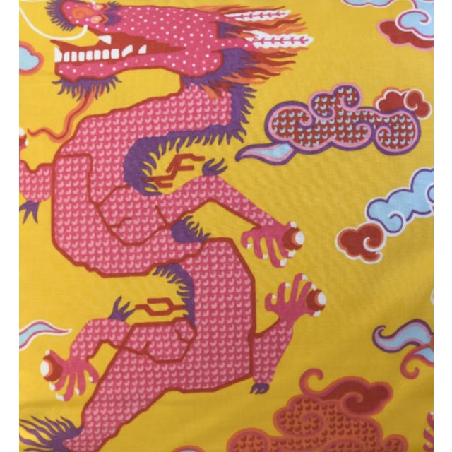 This pillow features Magical Ming Dragon by Johnson Hartig/Libertine for Schumacher. Hand-printed, stylized dragons are...