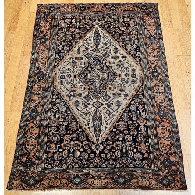 An elegant early 20th century Persian Malayer area rug from Northwest Persia, featuring the classic oversized Malayer...