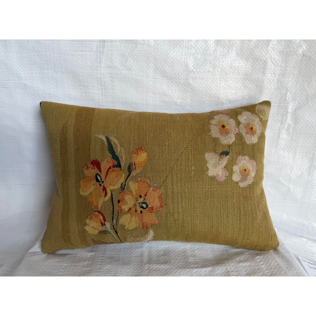 This beautiful circa 1850 French Aubusson tapestry pillow is created from an antique woven textile featuring delicate...