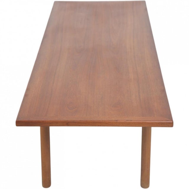 Hans Wegner AT12 coffee table made of teak, and produced by Andreas Tuck in the 1960s. The table is in good condition,...