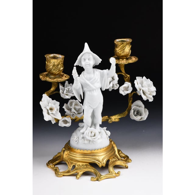 Description - Fine pair of gilt bronze two-light candelabra with wonderful blanc de chine porcelain chinoiserie figurines...