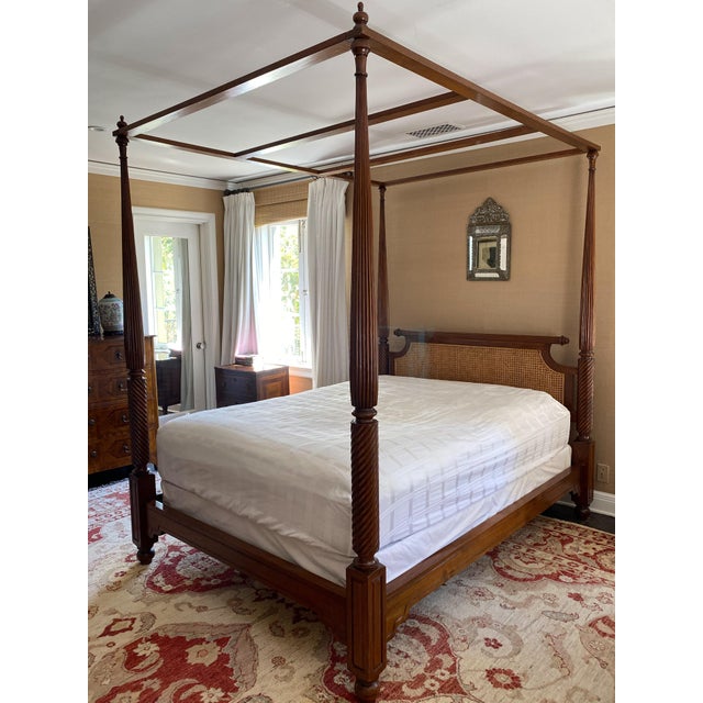 Stunning Vintage queen size canopy bed frame made by storied English furniture company, British Khaki. The Anglo-Indian...