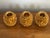 Pretty trio of gold pinecone candlestick holders, made by Department 56. Perfect winter shine. Please see condition...