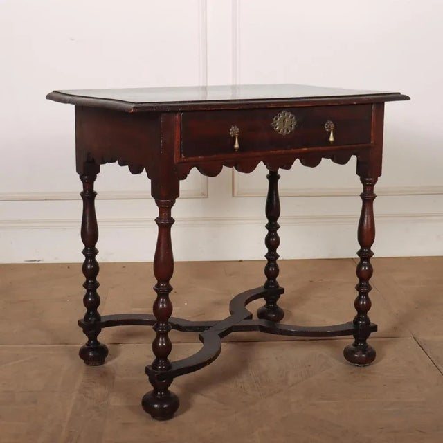 Early 18th C English oak and pine side / lamp table. 1720. This piece is designed in the style of the selected designer...