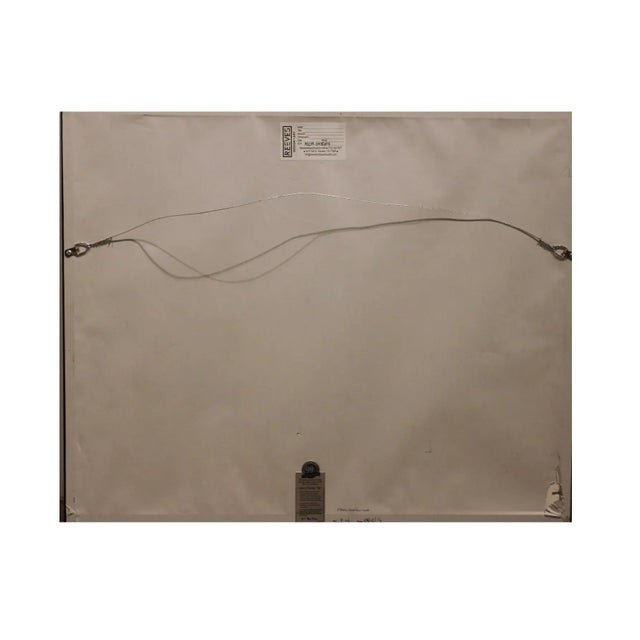 Blue, orange and pink pastel work done in an abstract geometric style. It is framed in a black frame with a white matte....