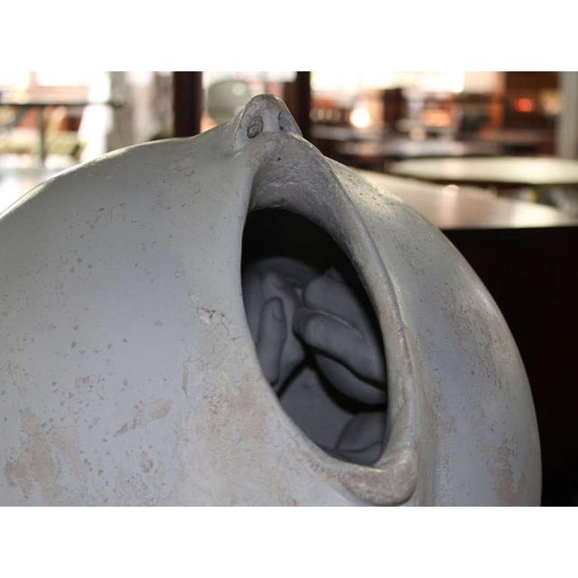 Very provocative looking ball shape mouth sculpture with internal elements of hands and apples. signed by Richard Etts &...